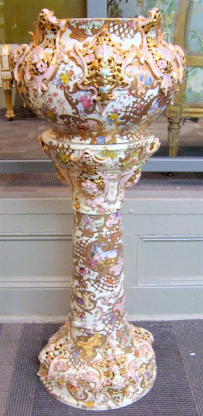 Appraisal: Zsolnay Pecs porcelain jardiniere on stand early th century The