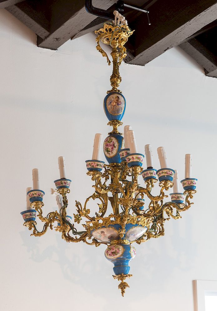 Appraisal: A FRENCH SEVRES-STYLE TURQUOISE-GROUND PORCELAIN AND ORMOLU MOUNTED TWELVE-LIGHT CHANDELIER