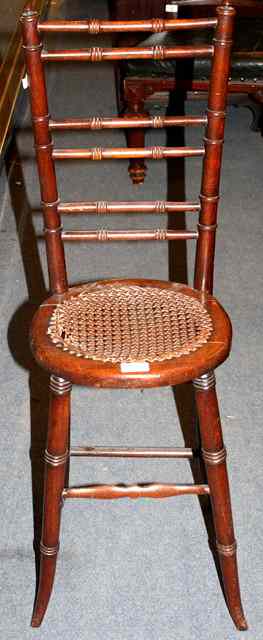 Appraisal: A TH CENTURY STAINED BEECH CHILD'S CORRECTION CHAIR the frame