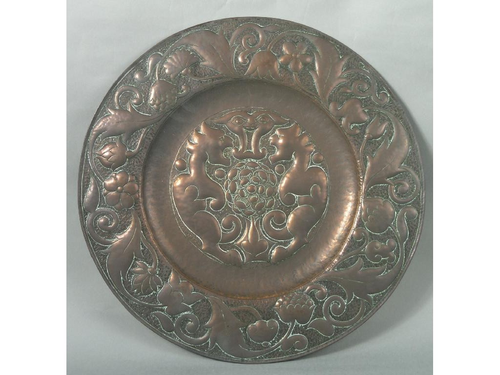 Appraisal: An Arts Crafts copper charger Newlyn type embossed with stylised