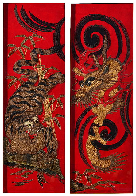 Appraisal: Pair of Japanese embroidered silk studiestiger and dragon with gold