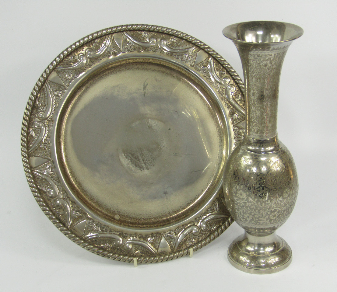 Appraisal: An Indian white metal vase of baluster form engraved with