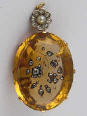 Appraisal: A fine antique citrine and diamond pendant the citrine carved