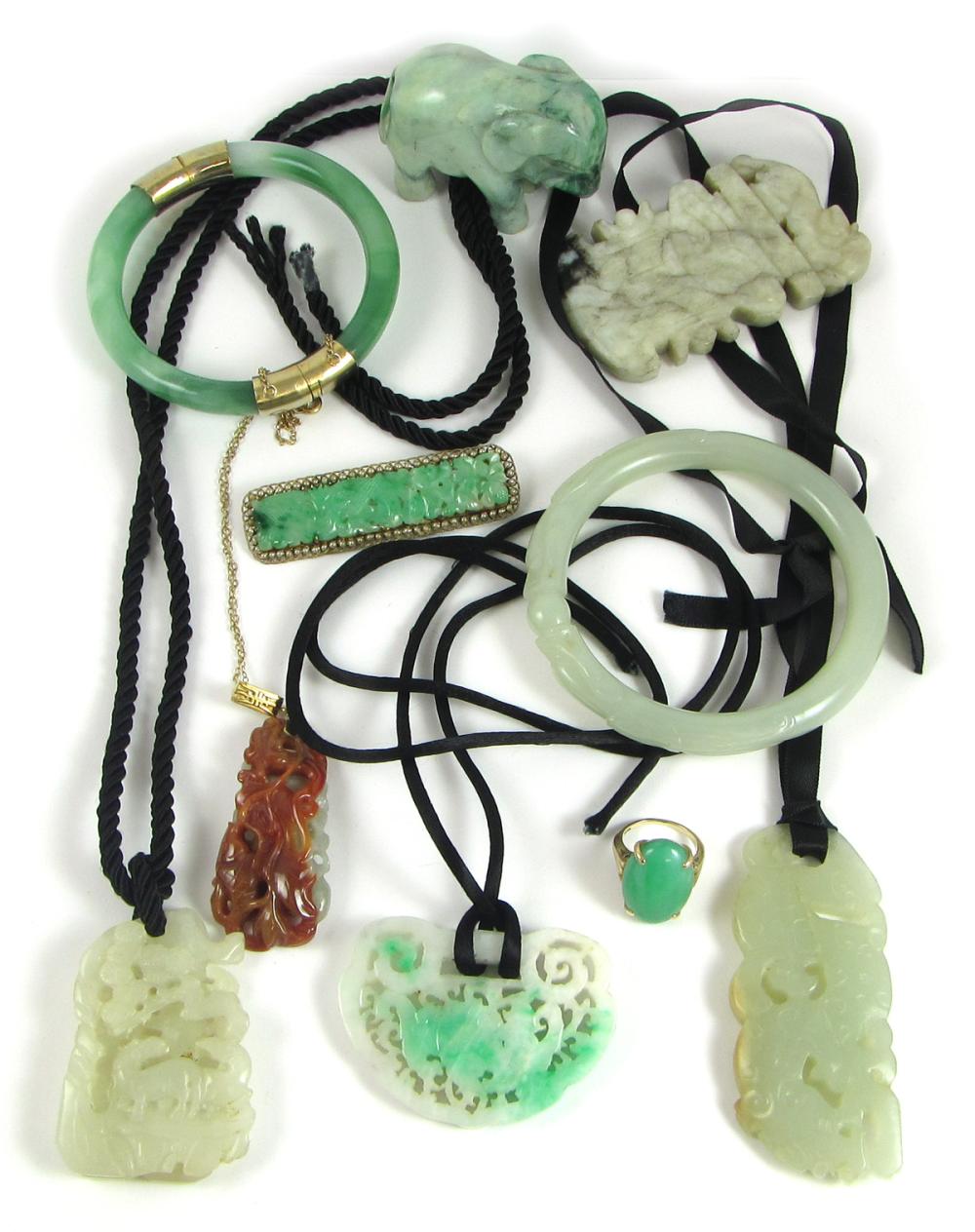 Appraisal: TEN ARTICLES OF JADE AND HARDSTONE pendant necklace with a