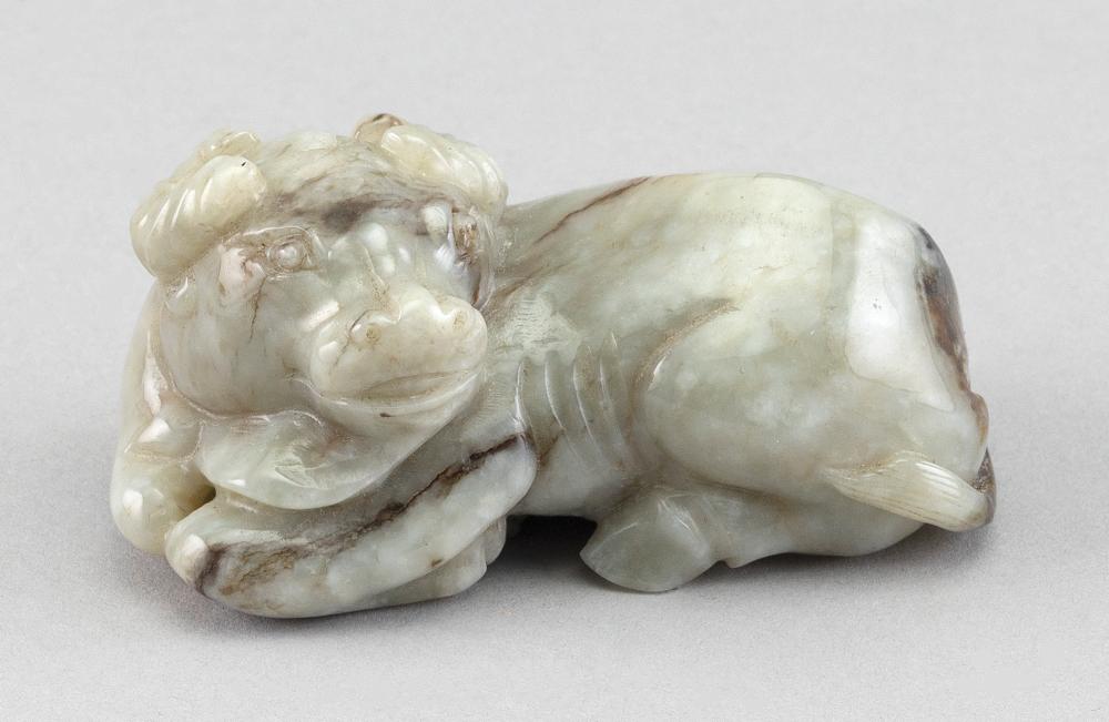 Appraisal: CHINESE MOTTLED JADE CARVING OF A RECLINING WATER BUFFALO LENGTH