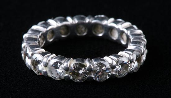 Appraisal: PLATINUM AND DIAMOND BAND Continuous circle of brilliant-cut round diamonds