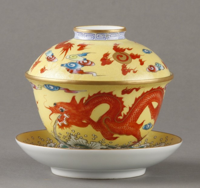 Appraisal: Teacup features yellow ground with red enamel dragon and goldfish