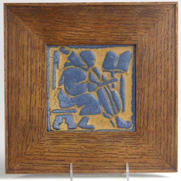 Appraisal: GRUEBY Tile embossed with medieval monk playing the cello in