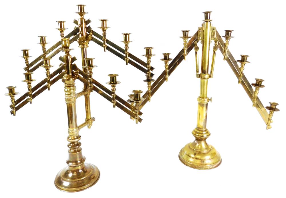 Appraisal: Two adjustable brass candelabras arm on each side is movable