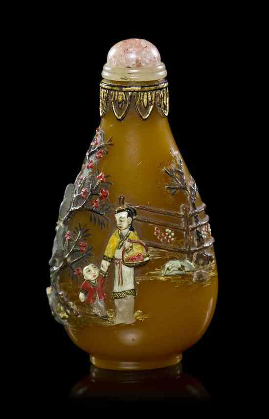 Appraisal: A Hardstone Embellished Glass Snuff Bottle the caramel colored bottle