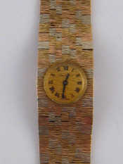 Appraisal: Beuche Girod A carat gold lady's wrist watch with integral