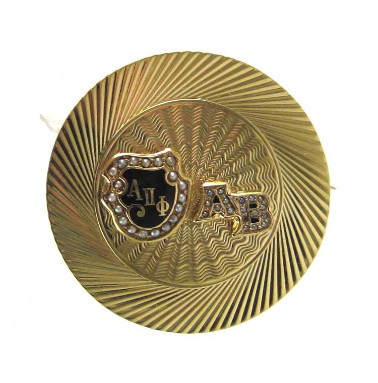 Appraisal: FOURTEEN KARAT GOLD SORORITY BROOCH with black enamel and seed