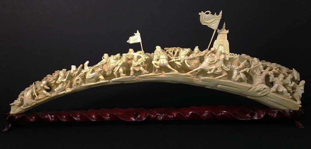 Appraisal: CHINESE CARVING HAVING MANY FIGURES IN A BATTLE SCENEExtensive carving