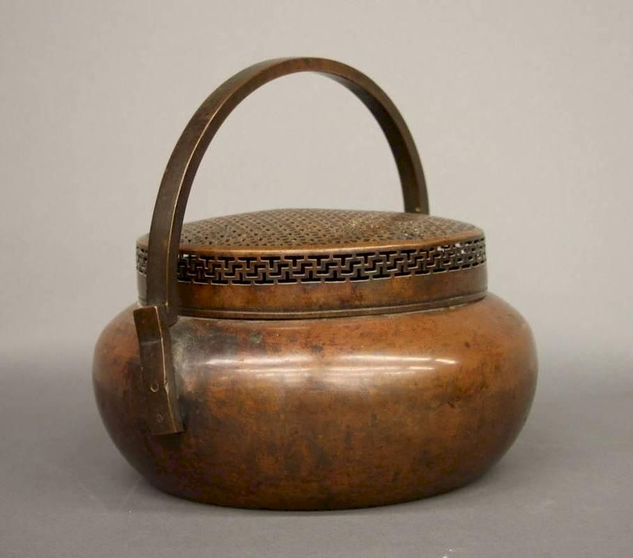 Appraisal: Chinese bronze pot A Chinese bronze pot Patinated bronze pot