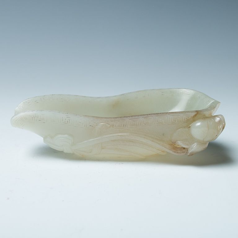 Appraisal: CELADON JADE 'MAGNOLIA' BRUSH WASHER Of an irregular oval form