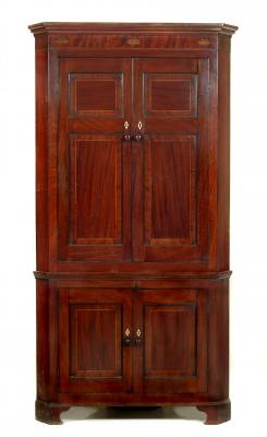 Appraisal: A GEORGE III MAHOGANY STANDING CORNER CUPBOARD c in two