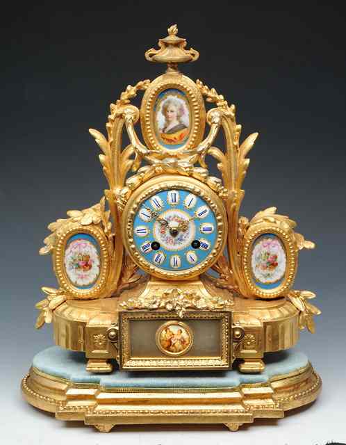 Appraisal: A TH CENTURY FRENCH GILT METAL MANTEL CLOCK the polychrome