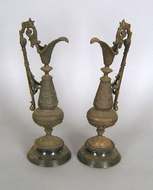 Appraisal: Pair of cast ewers h h