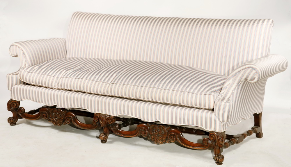 Appraisal: LATE VICTORIAN TUXEDO SOFA WITH FANCY CARVED BASE th c