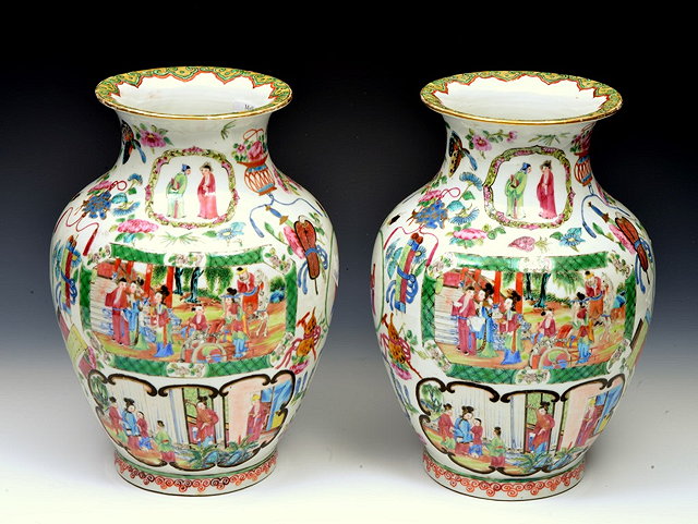 Appraisal: A PAIR OF CHINESE CANTON VASES each with polychrome decoration