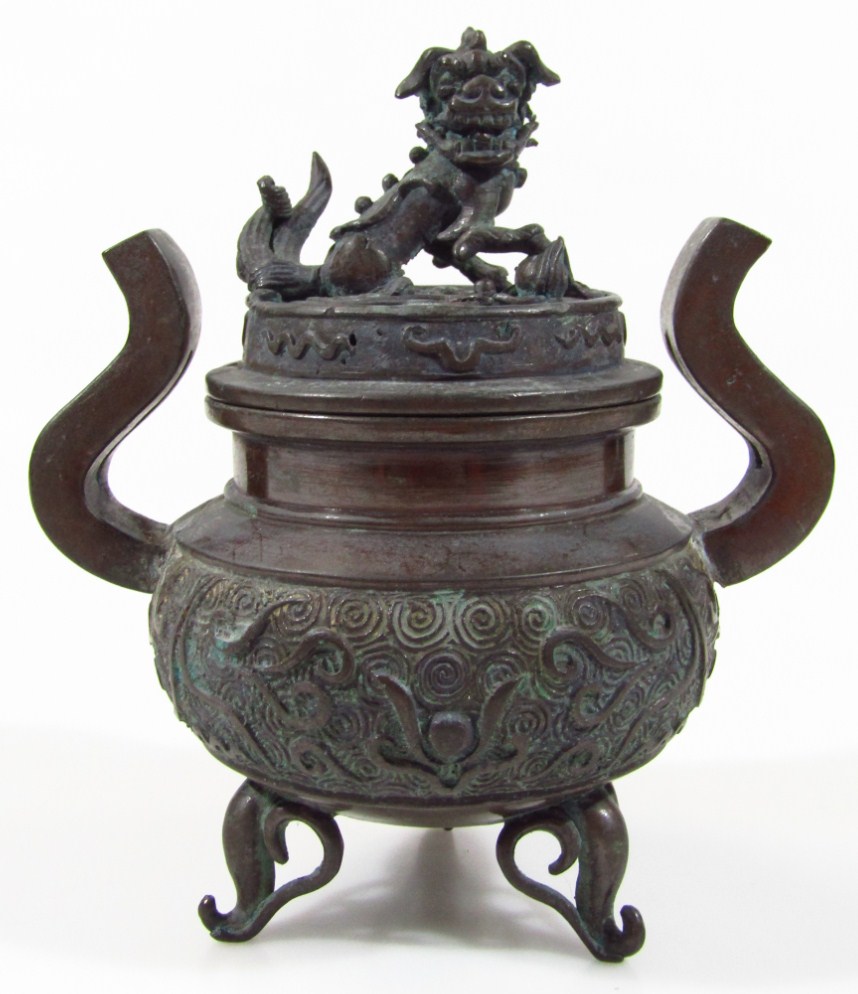 Appraisal: A thC Chinese bronze censer of compressed circular form with