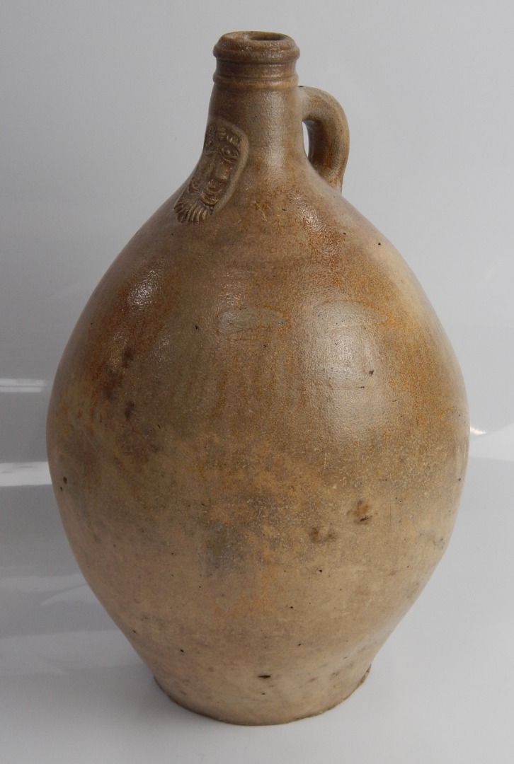 Appraisal: A thC Bellamine stoneware ewer of classical ovoid design with