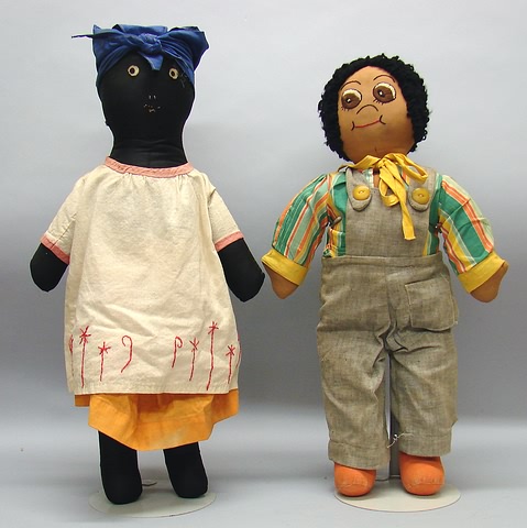 Appraisal: Pair of handmade black cloth dolls Mammy style and male