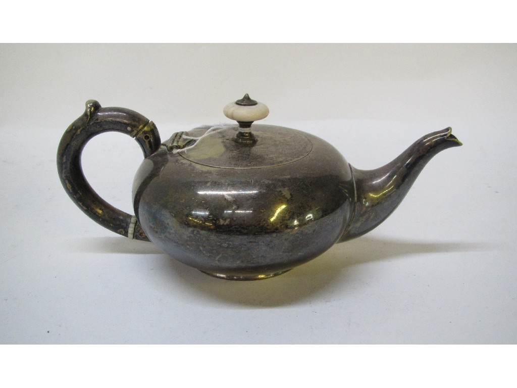 Appraisal: A Continental white metal teapot marked with a crown and