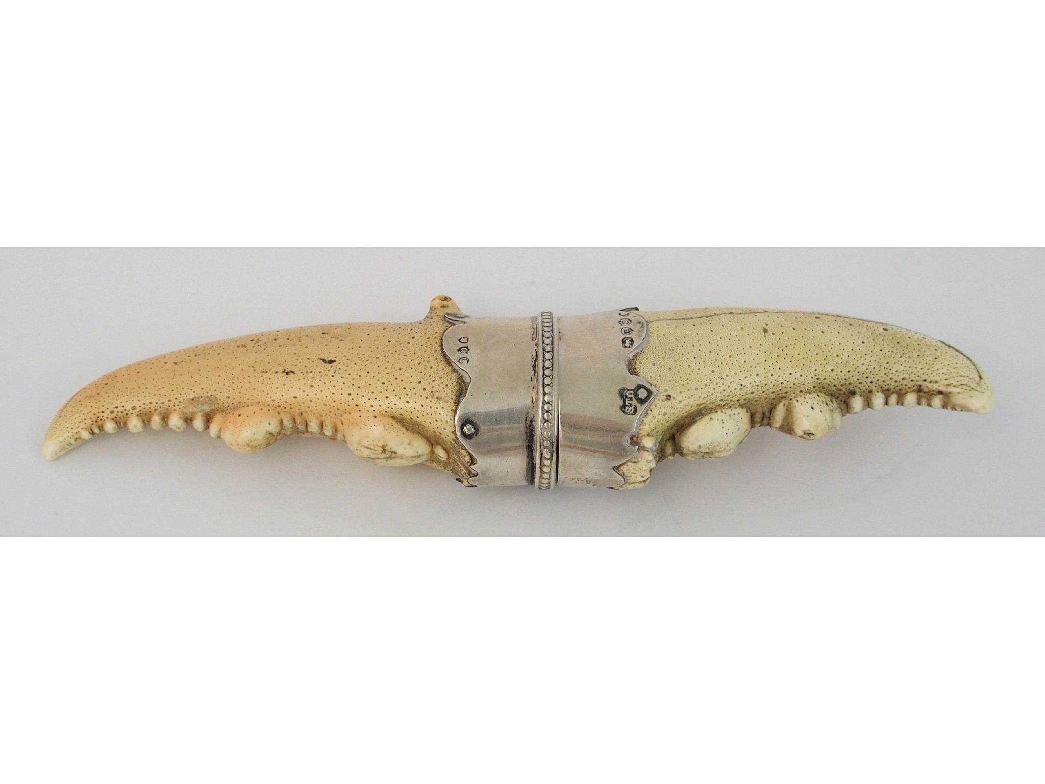 Appraisal: An unusual Victorian silver mounted lobster claw snuff mullby Gray