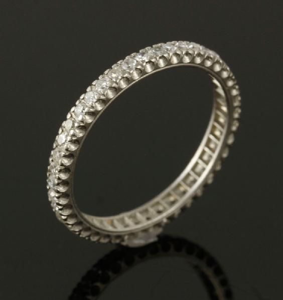 Appraisal: - Ladies' Platinum Diamond Eternity Band Ladies' platinum single cut