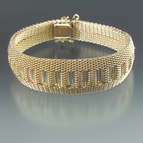 Appraisal: k yellow gold mesh bracelet tapered and flexible with V-spring