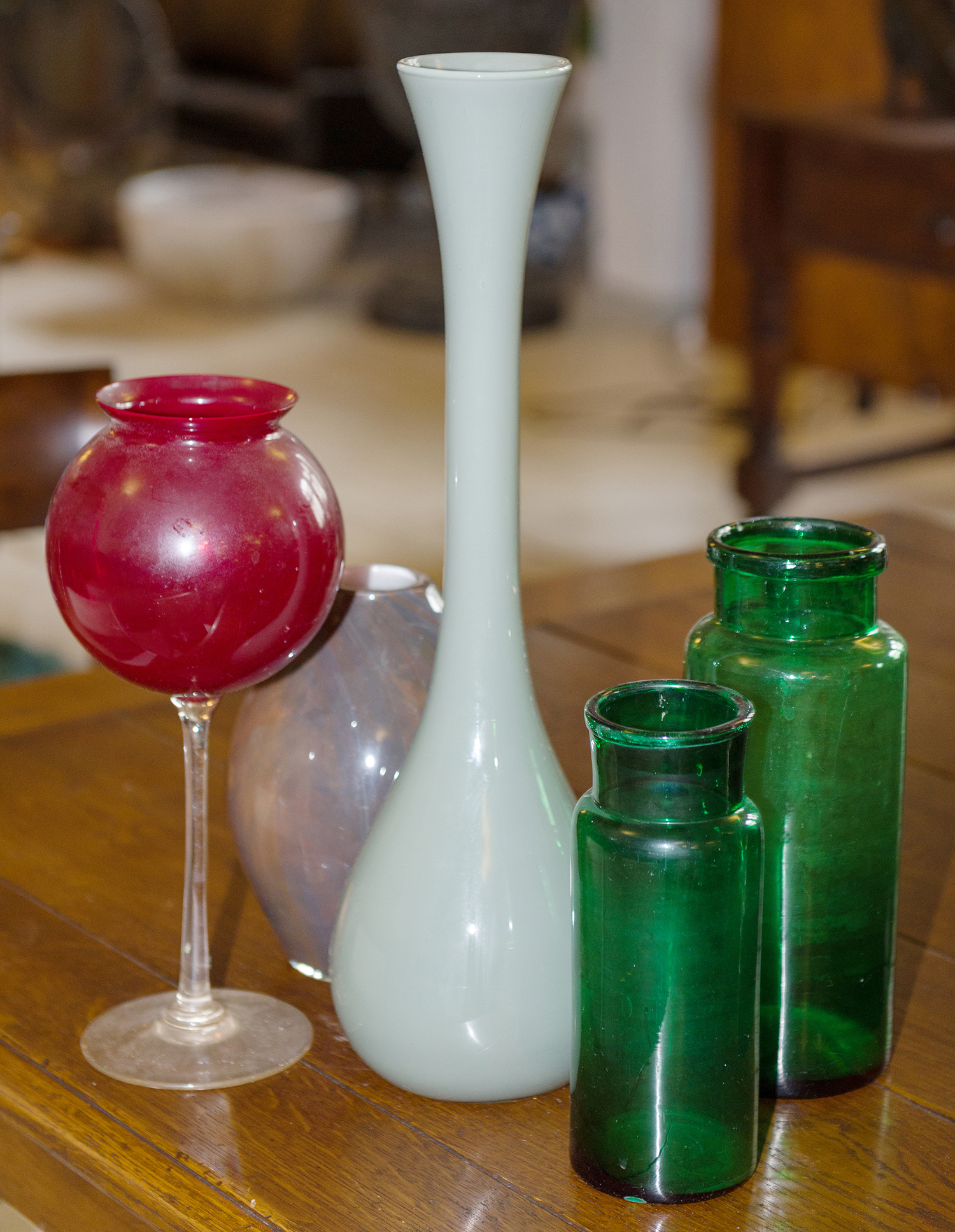 Appraisal: A COLLECTION OF COLOURED GLASS WARE tallest vase measuring h