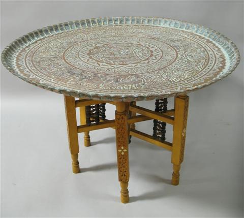 Appraisal: MIDDLE EASTERN COPPER TRAY TABLE ON STAND th century the