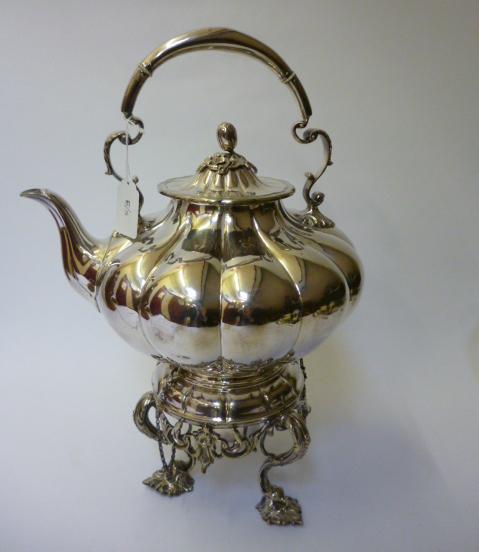 Appraisal: A VICTORIAN SPIRIT KETTLE ON STAND with burner of lobed