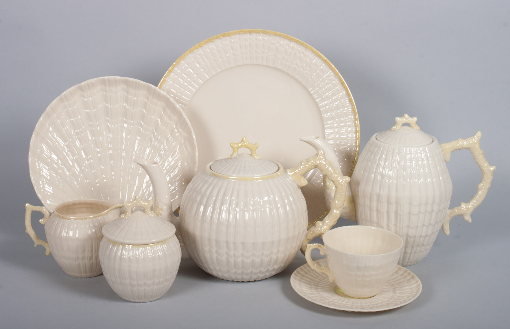 Appraisal: Belleek glazed parianware partial luncheon service in the Limpet pattern