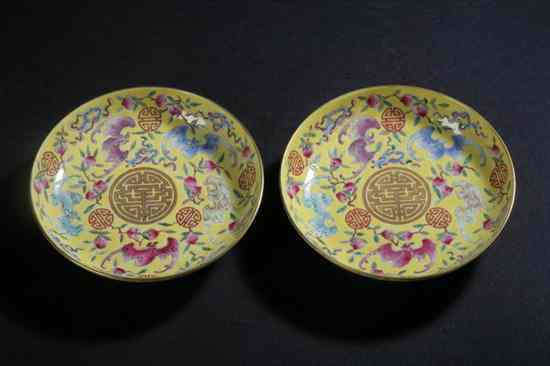 Appraisal: PAIR CHINESE FAMILLE ROSE PORCELAIN SAUCERS Guangxu six characters iron