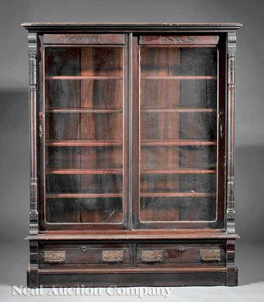 Appraisal: An American Aesthetic Carved Walnut Bookcase late th c molded