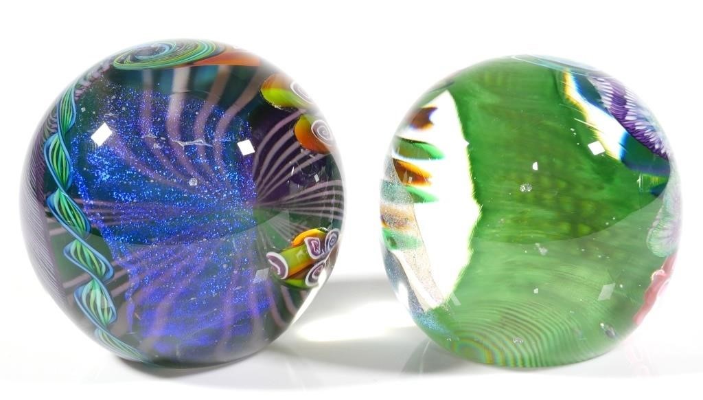 Appraisal: Two James Nowak art glass paperweights Each paperweight is signed