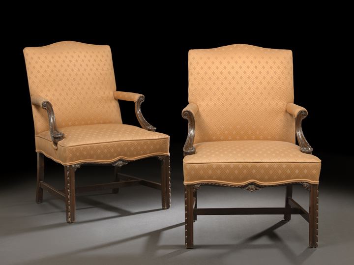 Appraisal: Pair of George III-Style Mahogany Gainsborough Chairs early th century