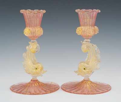 Appraisal: A Pair of Salviati Type Murano Glass Dolphin Candlesticks Each