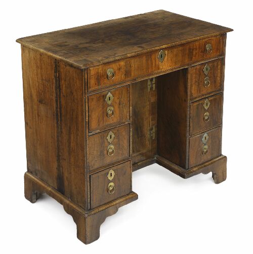 Appraisal: A William and Mary walnut kneehole desk the moulded cross