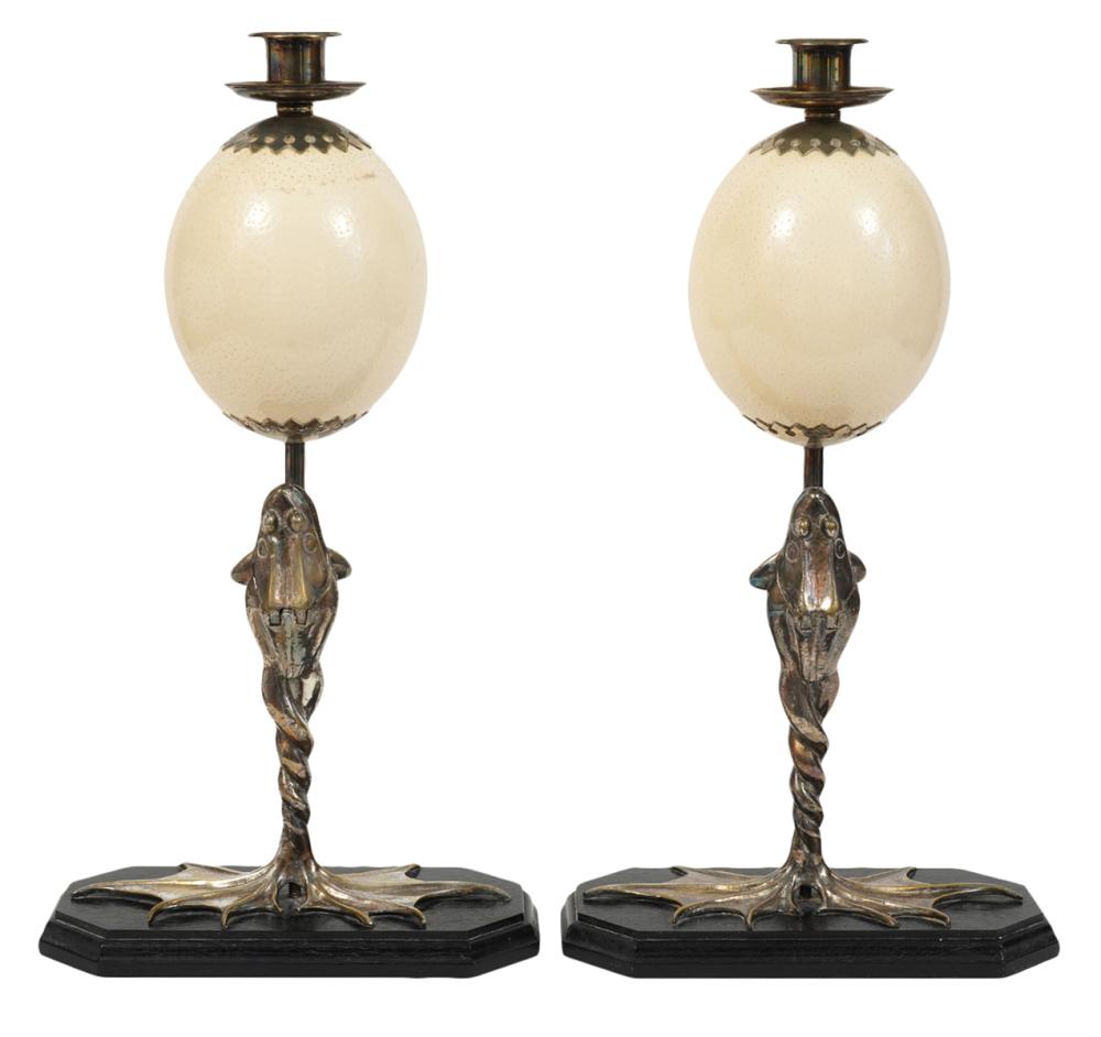 Appraisal: PR REDMILE FROG OSTRICH EGG CANDLESTICKSPair of Anthony Redmile silverplate