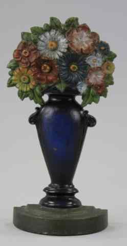 Appraisal: B H FLOWER VASE DOORSTOP Cast iron lovely and elegant