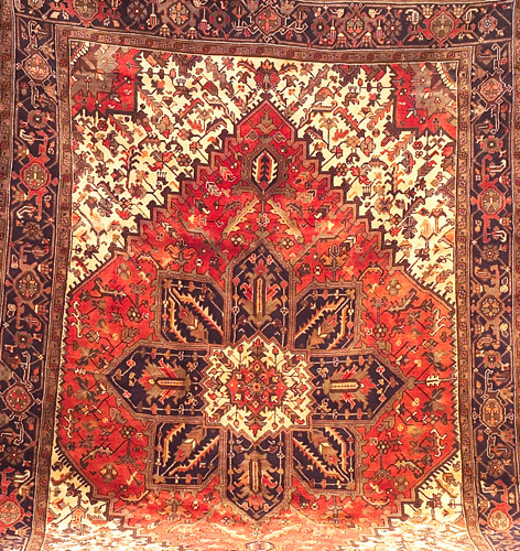 Appraisal: PERSIAN HERIZ room-size rug c s with eight-point star medallion