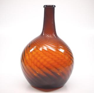 Appraisal: Pattern An early th century pattern-molded glass globular bottle Midwestern