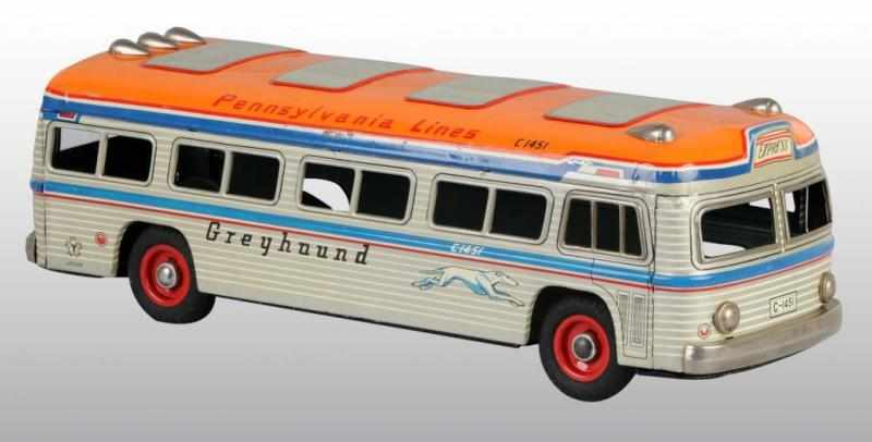 Appraisal: Tin Greyhound Bus Friction Toy Description Japanese Working Made by