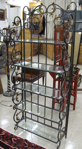 Appraisal: GLASS AND WROUGHT IRON DISPLAY STAND having five tiers of