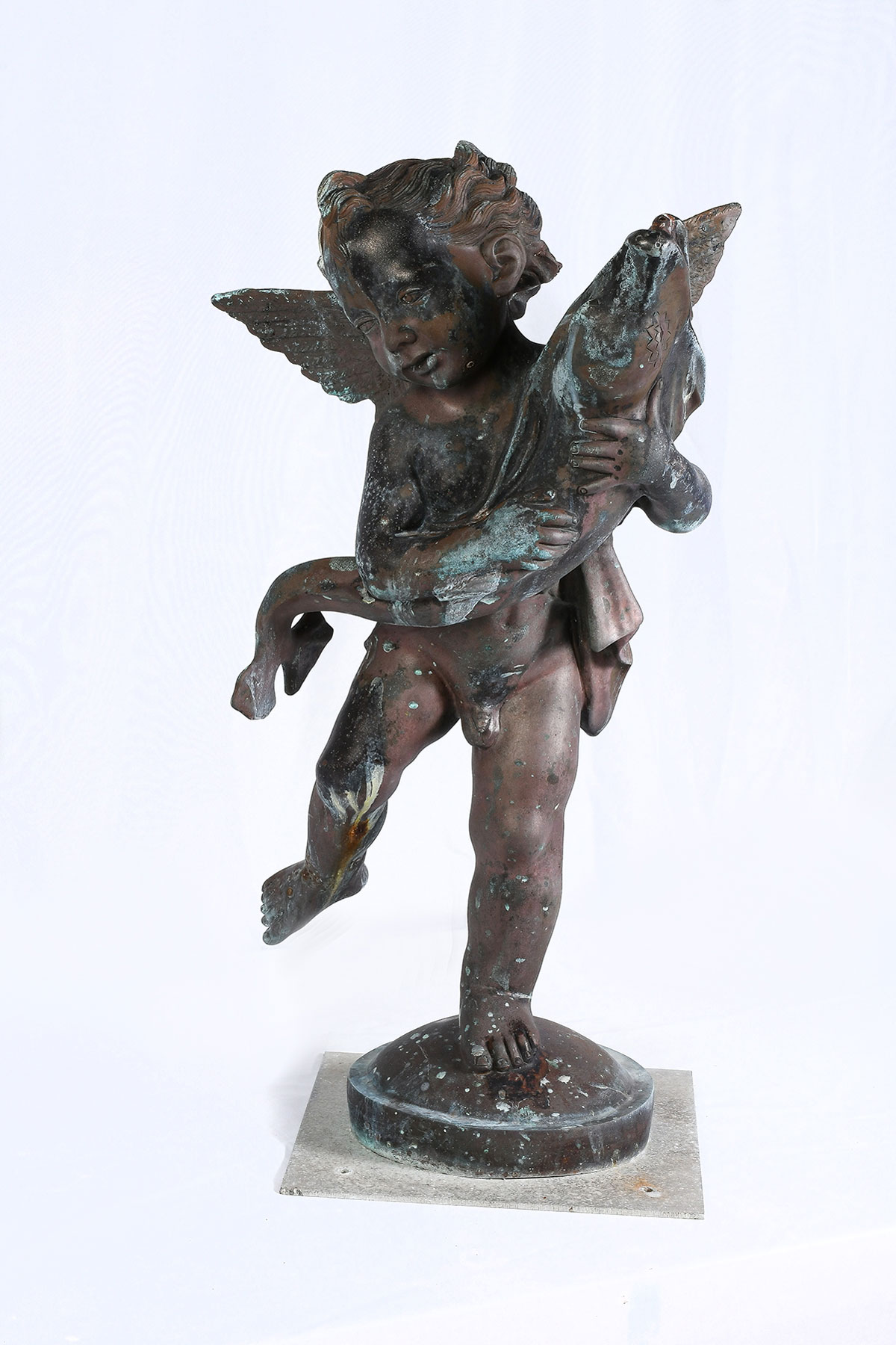 Appraisal: BRONZE ANGEL WITH FISH FOUNTAIN Bronze cherub or young angel