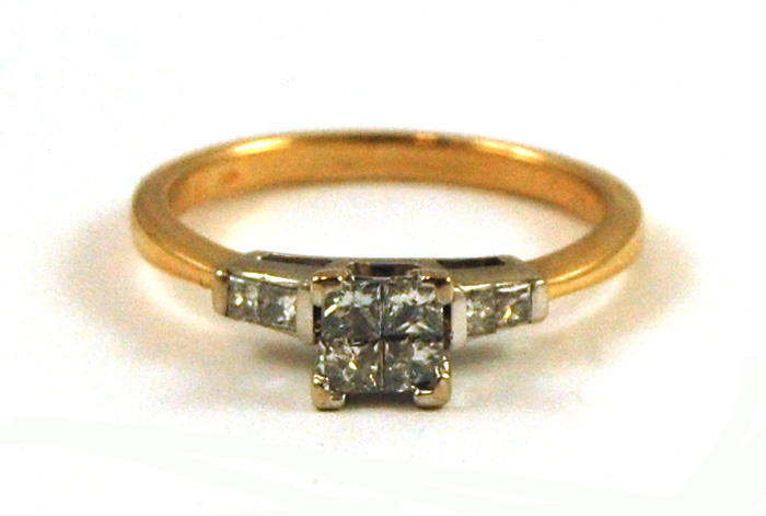 Appraisal: DIAMOND AND FOURTEEN KARAT GOLD RING The yellow and white