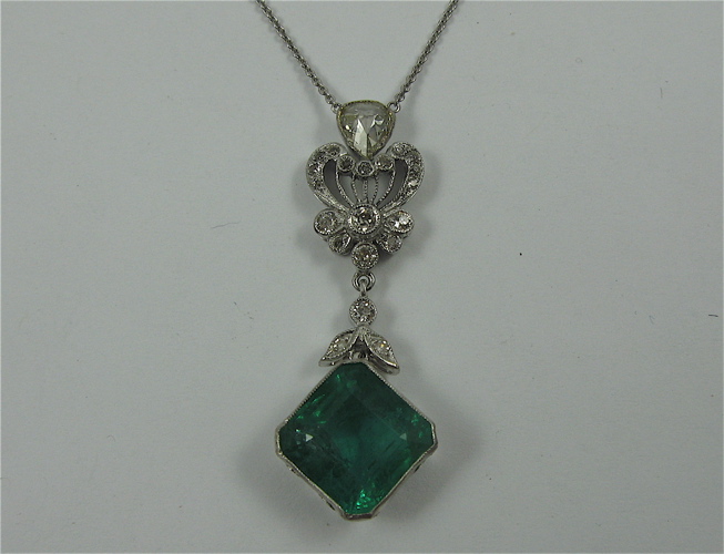 Appraisal: EMERALD DIAMOND AND K GOLD PENDANT NECKLACE the white gold